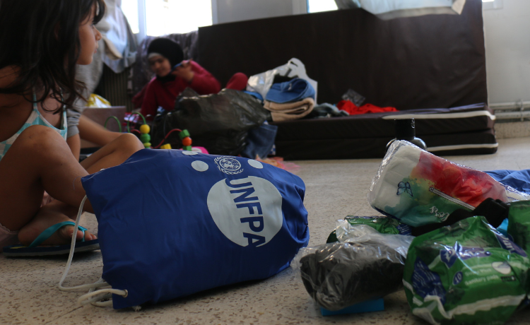 Supplies are distributed at Houssein Massoud Public School, which has been turned into a shelter for displaced families, in Lebanon. © UNFPA Lebanon/Anastacia Hajj