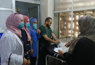 Health workers provide information and care the Daraa National Hospital © UNFPA/SFPA