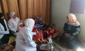 The medical mobile team in a follow up visit to Adlah, at her home for post- natal care service in Qureyah village, Deir ez-Zor 